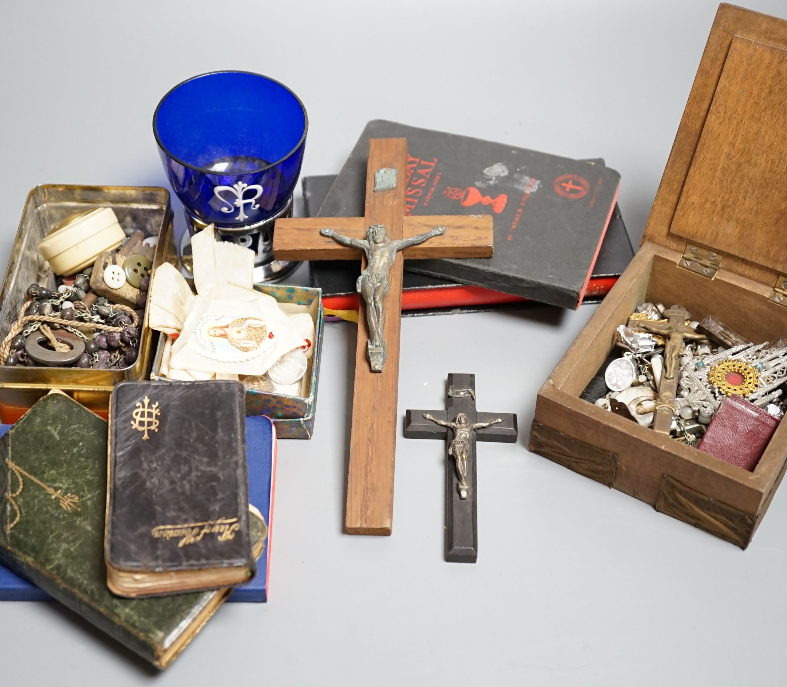 A Dieppe ivory carving of the Madonna and Child on ebonised socle, height 19cm, a crucifix, various rosaries etc.